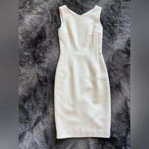 Dolce & Gabbana. Hourglass cream colored dress. Size 4.